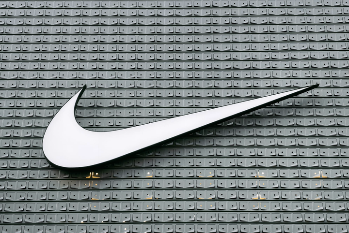 Nike swoosh logo.